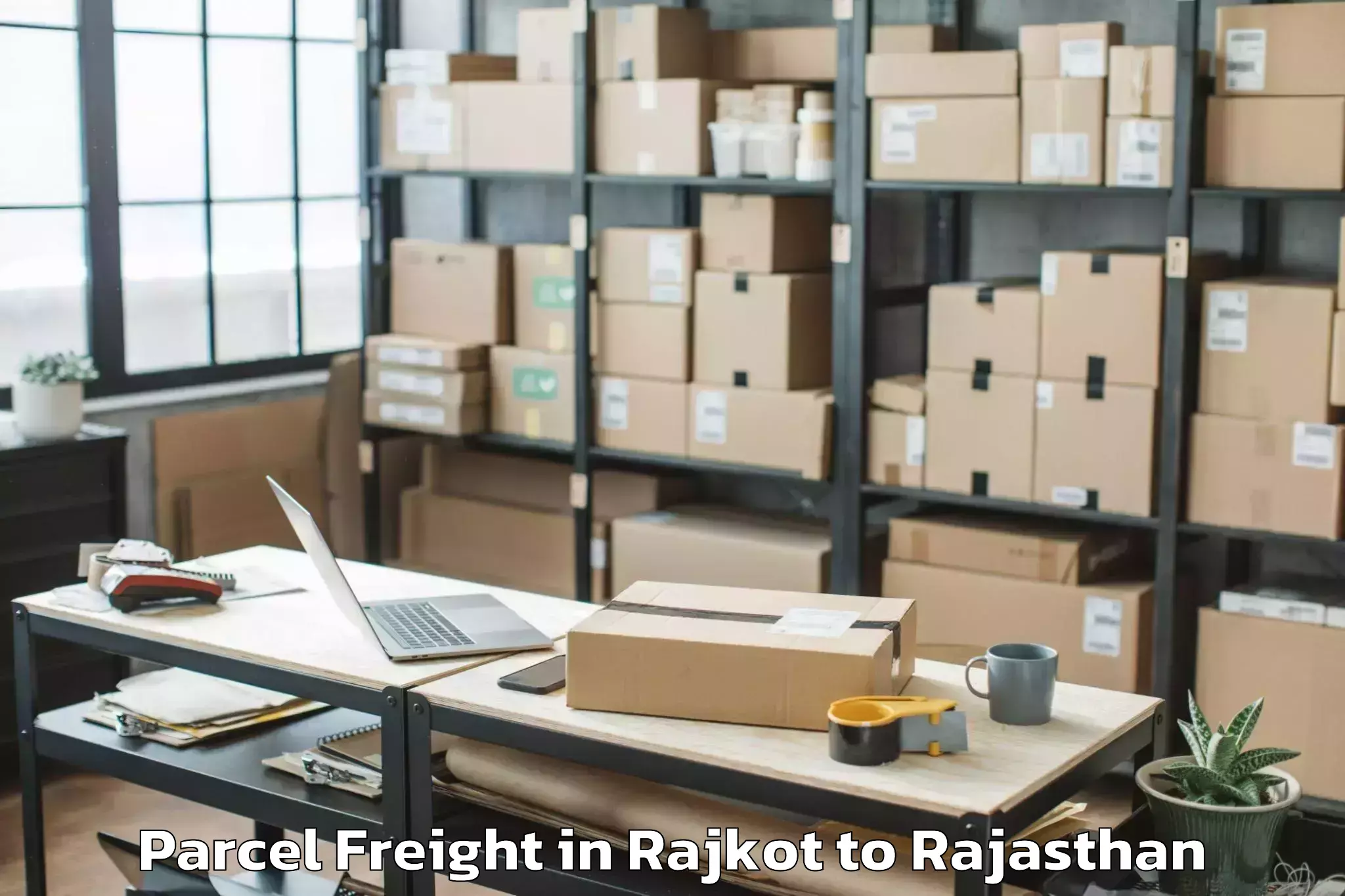 Leading Rajkot to Abhaneri Parcel Freight Provider